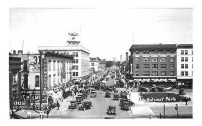 CAPITOL-FROM-DEPOT A historic aerial photo of Capitol Avenue, featuring cars driving through the streets.