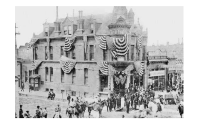 TIVOLI-WITH-BANNERS A historic photo of The Tivoli building in Cheyenne, strung with festive banners.