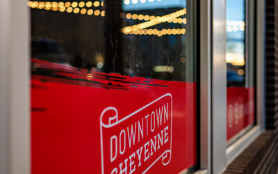 Downtown Logo – Window Vinyl Red window vinyl displays a Downtown Cheyenne logo in white