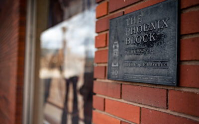 The Phoenix Block marker A close-up of The Phoenix Block marker against a brick building.