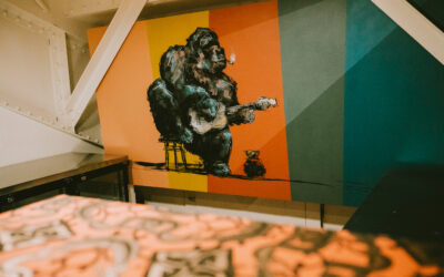 Gorilla Art Artwork depicts a smoking gorilla playing guitar.