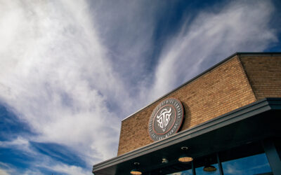 Black Tooth Brewing Company Brick building with exterior logo signage for Black Tooth Brewing Company