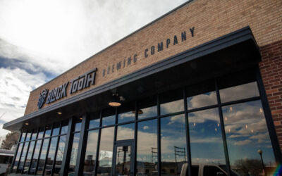 Black Tooth Brewing Company Brick building with exterior signage for Black Tooth Brewing Company