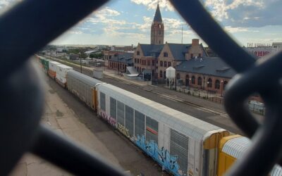 RAILYARD DEPOT The Cheyenne Depot Plaza is creatively framed by a portion of chain link fence.