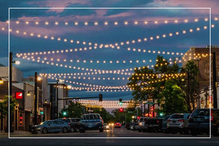 Downtown Cheyenne at dusk with string lights