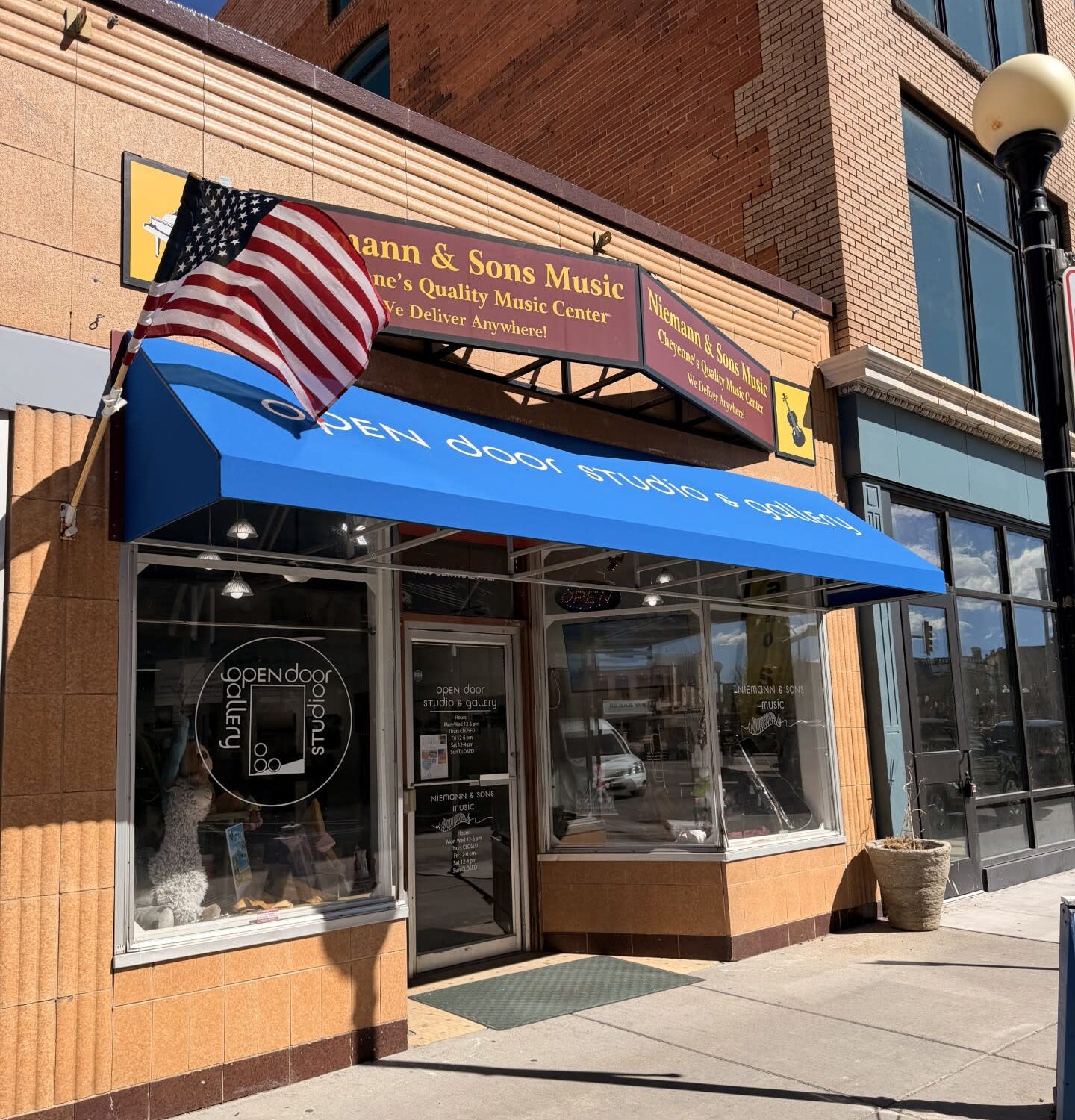 Exterior of Niemann and Sons Music and Open Door Studio and Gallery, a store in Downtown Cheyenne.